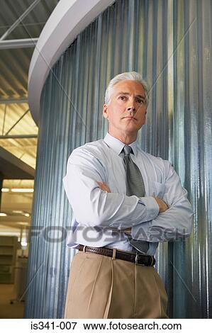 Businessman looking up View Large Photo Image Stock Photo - Businessman looking up. Fotosearch