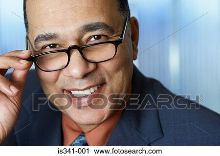 Businessman wearing glasses View Large Photo Image Stock Image - Businessman wearing glasses. Fotosearch