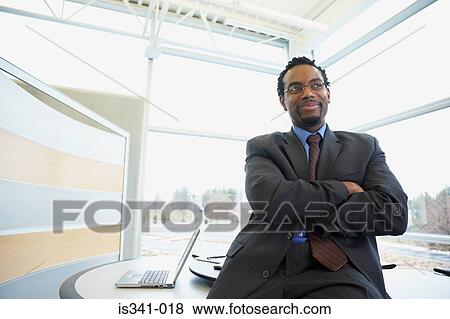 Confident businessman View Large Photo Image Stock Photo - Confident businessman. Fotosearch