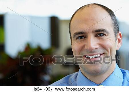 Stock Photo - Office worker smiling. Fotosearch