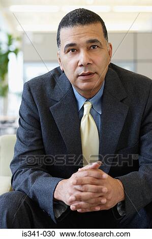 Pensive businessman View Large Photo Image Stock Image - Pensive businessman. Fotosearch