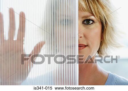 Woman behind partition View Large Photo Image Stock Photography - Woman behind partition. Fotosearch