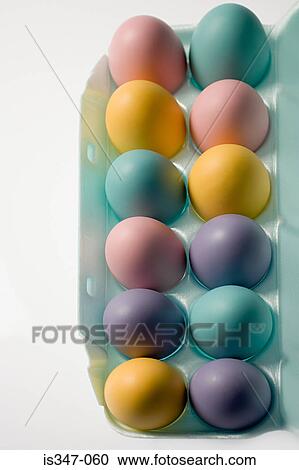 Carton of colourful eggs View Large Photo Image Stock Image - Carton of colourful eggs. Fotosearch