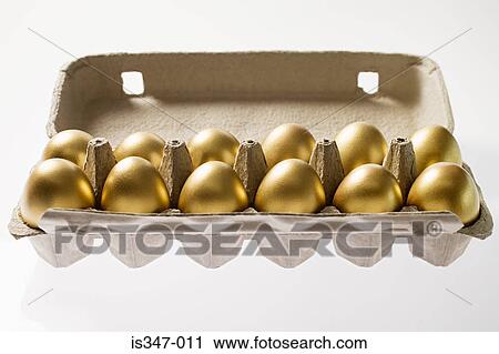 Golden eggs in a carton View Large Photo Image Stock Image - Golden eggs in a carton. Fotosearch