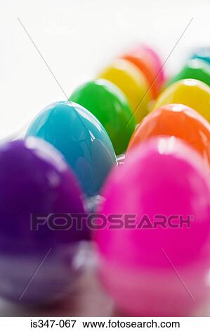 Plastic colourful eggs View Large Photo Image Stock Photo - Plastic colourful eggs. Fotosearch