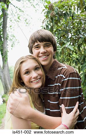 Portrait of a teenage couple View Large Photo Image Stock Image - Portrait of a teenage couple. Fotosearch