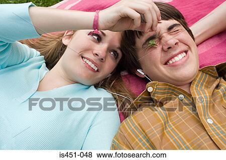 Teenage couple fooling around View Large Photo Image Stock Photo - Teenage couple fooling around. Fotosearch