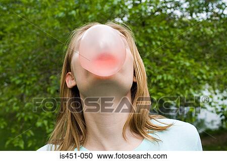 Teenage girl blowing a bubble gum bubble View Large Photo Image Stock Image - Teenage girl blowing a bubble gum bubble. Fotosearch