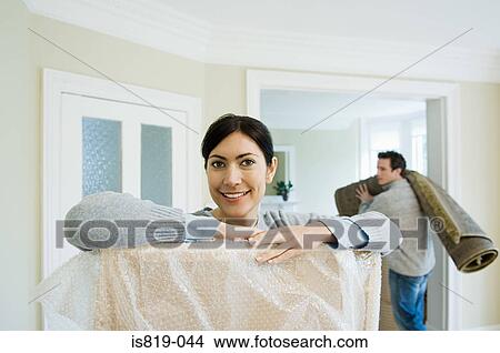 Couple in new house View Large Photo Image Picture - Couple in new house. Fotosearch