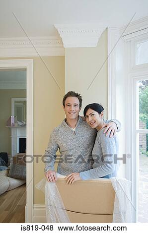 Couple in new house View Large Photo Image Stock Photo - Couple in new house. Fotosearch