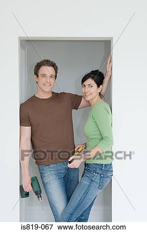 Couple with tools View Large Photo Image Stock Photo - Couple with tools. Fotosearch