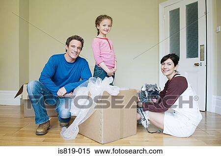 Family and dog in new house View Large Photo Image Stock Photography - Family and dog in new house. Fotosearch