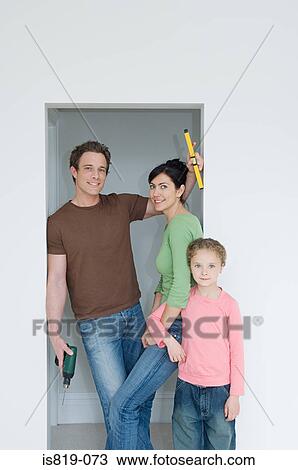 Family in new home View Large Photo Image Stock Image - Family in new home. Fotosearch