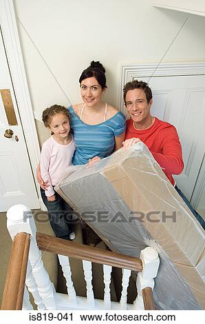 Family on stairs with mattress View Large Photo Image Stock Image - Family on stairs with mattress. Fotosearch