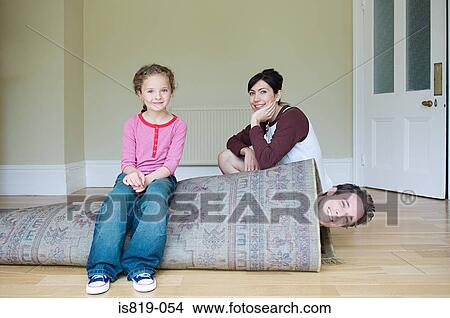 Father rolled up in a rug View Large Photo Image Picture - Father rolled up in a rug. Fotosearch
