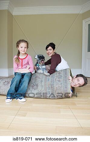 Father rolled up in a rug View Large Photo Image Stock Image - Father rolled up in a rug. Fotosearch
