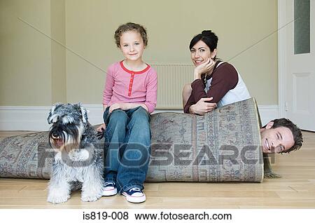 Father rolled up in a rug View Large Photo Image Stock Photo - Father rolled up in a rug. Fotosearch
