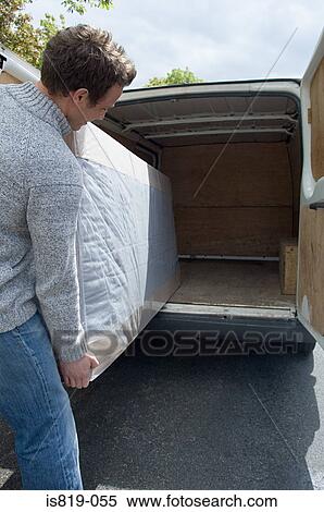Man moving mattress from van View Large Photo Image Stock Photography - Man moving mattress from van. Fotosearch