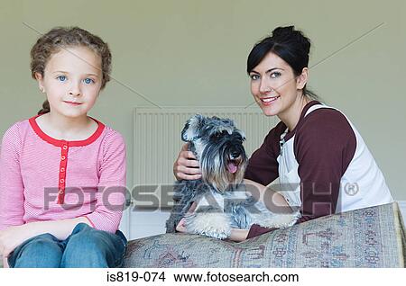 Mother and daughter with pet dog View Large Photo Image Picture - Mother and daughter with pet dog. Fotosearch