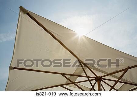 Parasol on sunny day View Large Photo Image Stock Photo - Parasol on sunny day. Fotosearch