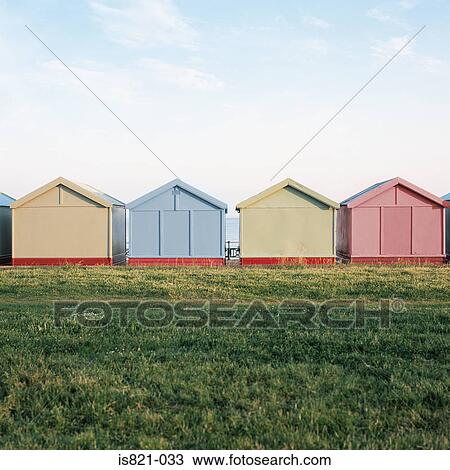 Row of beach huts View Large Photo Image Stock Image - Row of beach huts. Fotosearch
