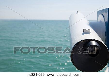 Telescope by the sea View Large Photo Image Stock Photo - Telescope by the sea. Fotosearch