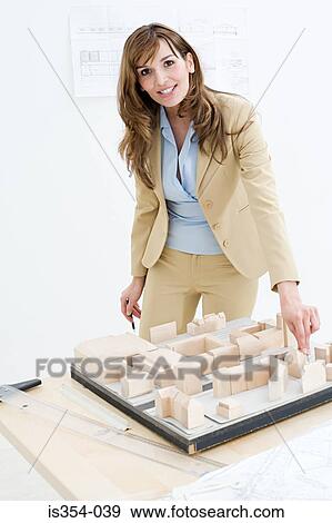 Architect with fashion model View Large Photo Image Stock Photo - Architect with fashion model. Fotosearch