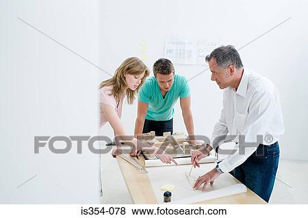 Architects working View Large Photo Image Stock Photo - Architects working. Fotosearch