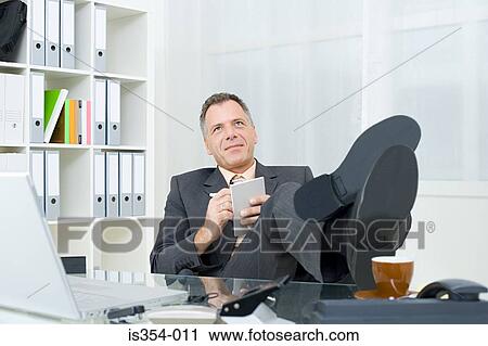Business man with notepad View Large Photo Image Stock Image - Business man with notepad. Fotosearch