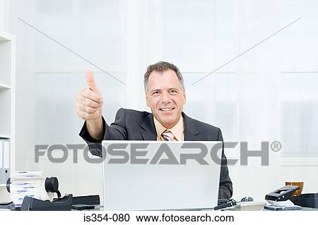 Businessman giving thumbs up View Large Photo Image Stock Image - Businessman giving thumbs up. Fotosearch