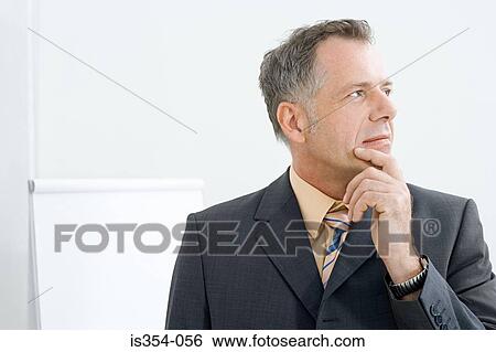 Businessman thinking View Large Photo Image Stock Photograph - Businessman thinking. Fotosearch