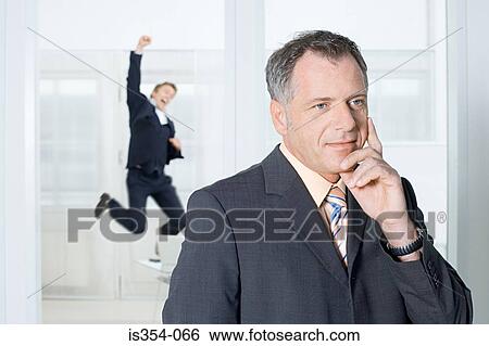 Stock Photograph - Businessmen thinking and jumping. Fotosearch