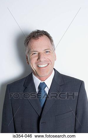 Portrait of a businessman View Large Photo Image Stock Photograph - Portrait of a businessman. Fotosearch