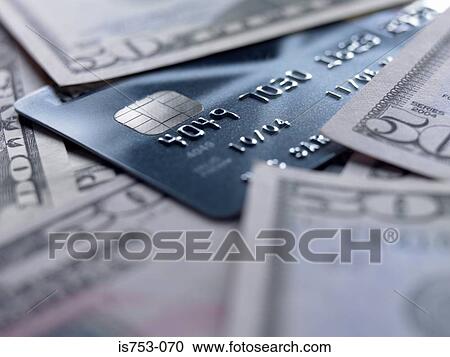 Credit card amongst fifty dollar notes View Large Photo Image Stock Image - Credit card amongst fifty dollar notes. Fotosearch