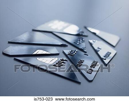 Stock Image - Cut up credit card. Fotosearch