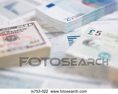 Different currencies on paperwork View Large Photo Image Stock Image - Different currencies on paperwork. Fotosearch