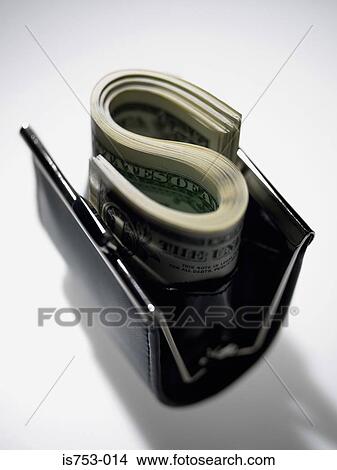 Dollars in a purse View Large Photo Image Picture - Dollars in a purse. Fotosearch
