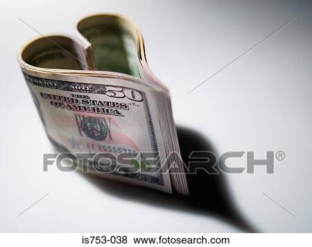 Fifty dollar notes in a heart shape View Large Photo Image Stock Photo - Fifty dollar notes in a heart shape. Fotosearch