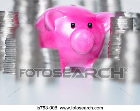 Stock Photo - Piggy bank and stacks of coins. Fotosearch