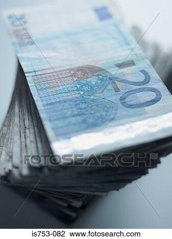 Stock Image - Pile of twenty euro notes. Fotosearch