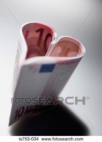 Ten euro notes in a heart shape View Large Photo Image Picture - Ten euro notes in a heart shape. Fotosearch