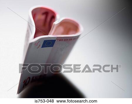 Ten euro notes in a heart shape View Large Photo Image Stock Photo - Ten euro notes in a heart shape. Fotosearch