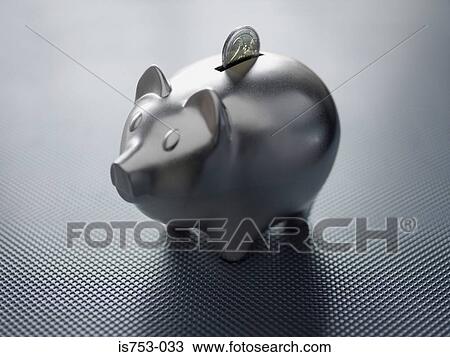 Two euro coin in a piggy bank View Large Photo Image Stock Image - Two euro coin in a piggy bank. Fotosearch