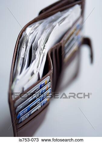 Wallet full of cards and receipts View Large Photo Image Stock Image - Wallet full of cards and receipts. Fotosearch