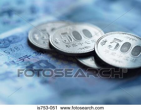 Stock Image - Yen coins and banknotes. Fotosearch