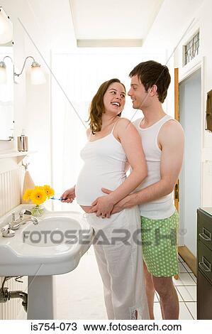 Man hugging pregnant partner View Large Photo Image Stock Image - Man hugging pregnant partner. Fotosearch