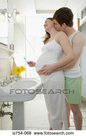 Man kissing pregnant partners neck View Large Photo Image Stock Photo - Man kissing pregnant partners neck. Fotosearch