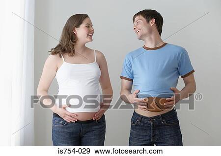 Pregnant woman and partner View Large Photo Image Stock Photo - Pregnant woman and partner. Fotosearch