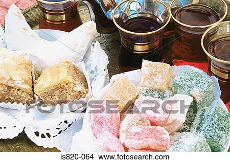 Baklava turkish delight kaab el ghzal and mint tea View Large Photo Image Picture - Baklava turkish delight kaab el ghzal and mint tea. Fotosearch