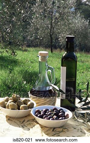 Stock Image - Olive oil and olives. Fotosearch